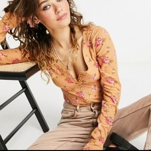 Free People Dylan Thermal Waffle Knit Floral Long Sleeve Henley Bodysuit.